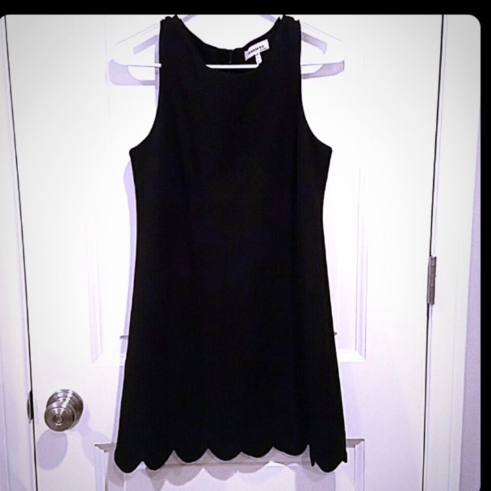Little Black mini scalloped dress.